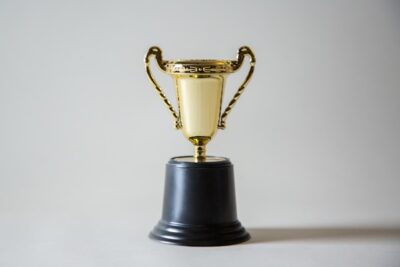 yellow and white trophy